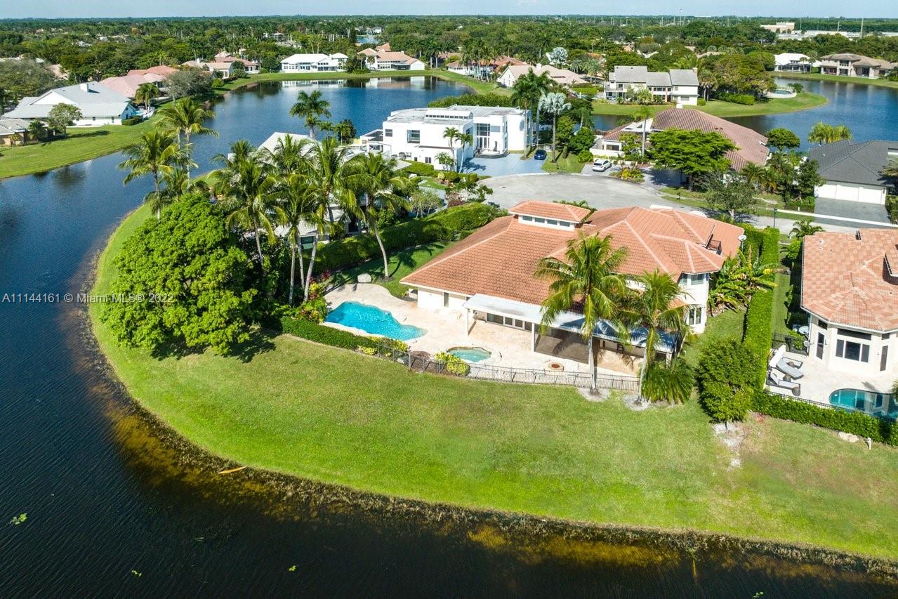 3060 Hampton Place Boca Raton, FL 33434 - Photo 54 of 60 an aerial view of a house with a lake view