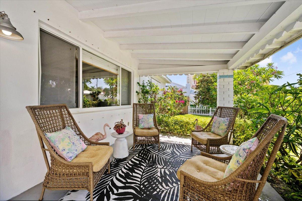 200 East 28th Street Riviera Beach, FL 33404 - Photo 3 of 22 a outdoor space with patio the couches and a dining table with garden view