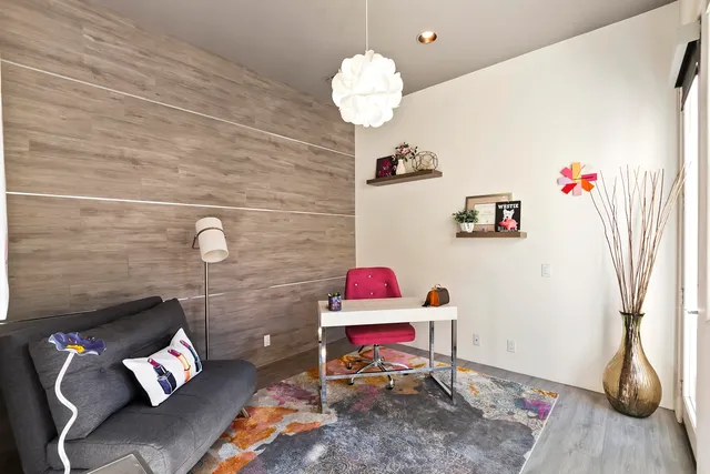 a living room with furniture and a table