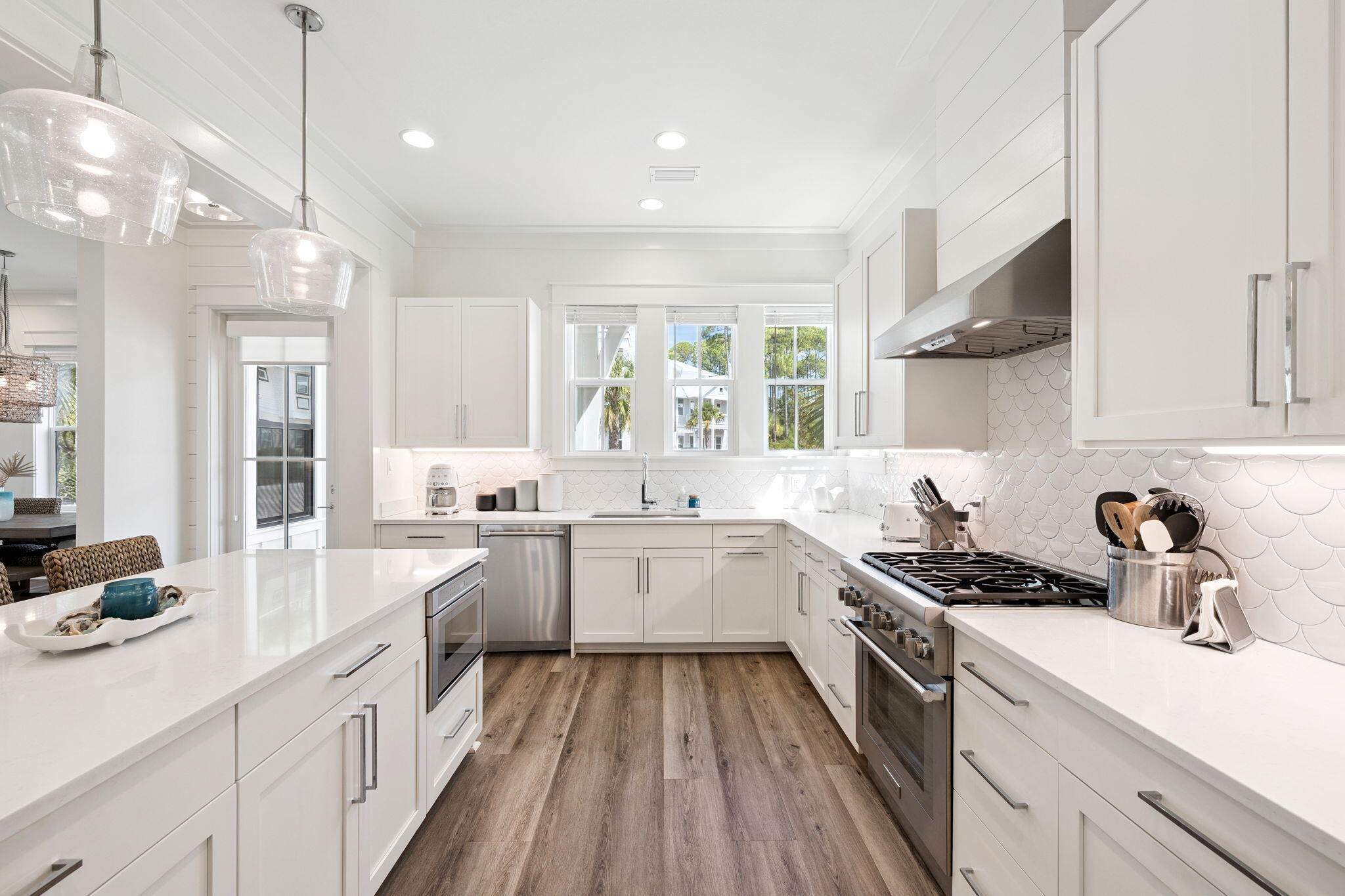 185 Redbud Ln Inlet Beach Inlet Beach, FL 32461 - Photo 11 of 71 a kitchen with sink stove and cabinets