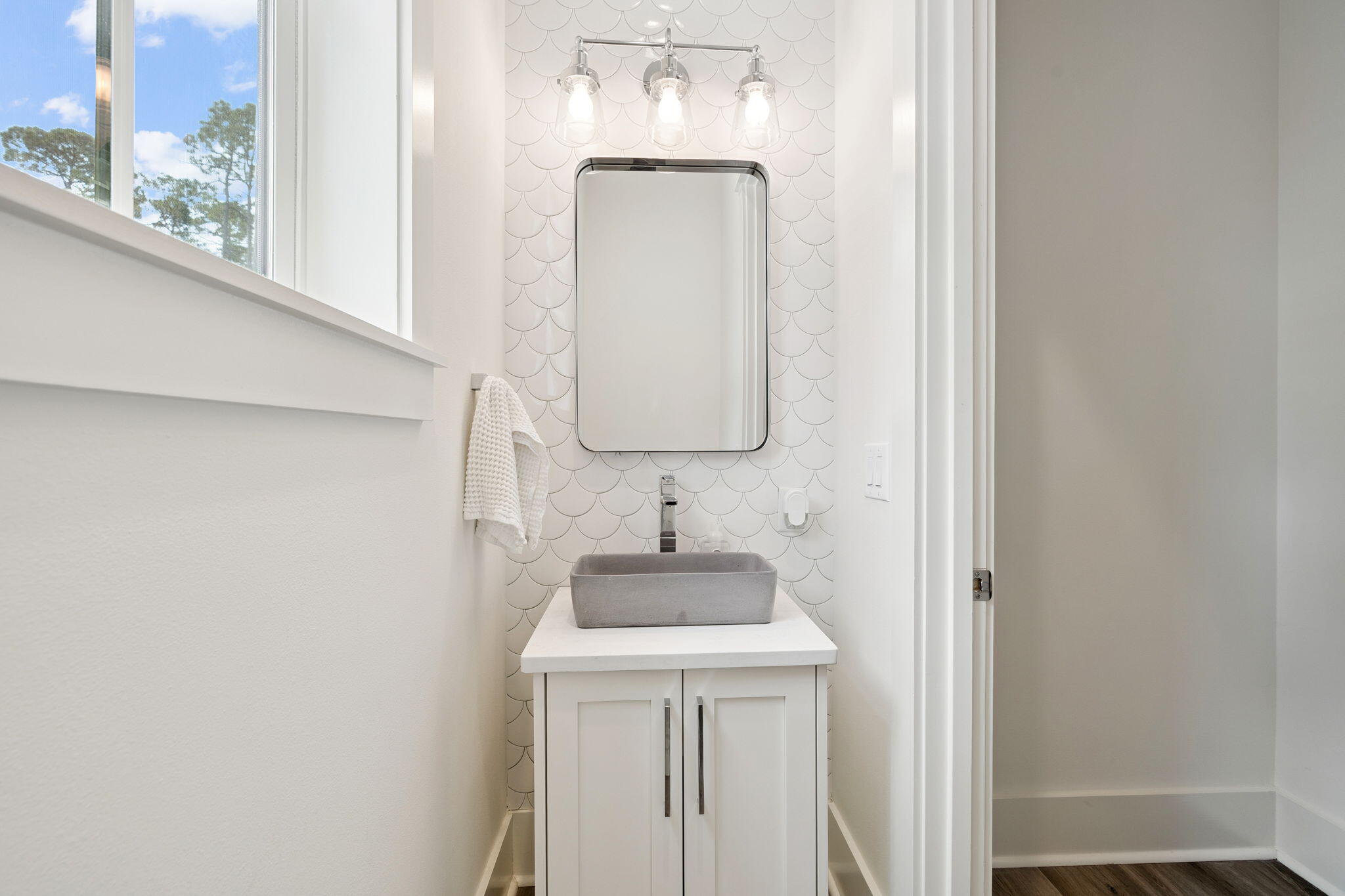 185 Redbud Ln Inlet Beach Inlet Beach, FL 32461 - Photo 19 of 71 a bathroom with a sink and a mirror