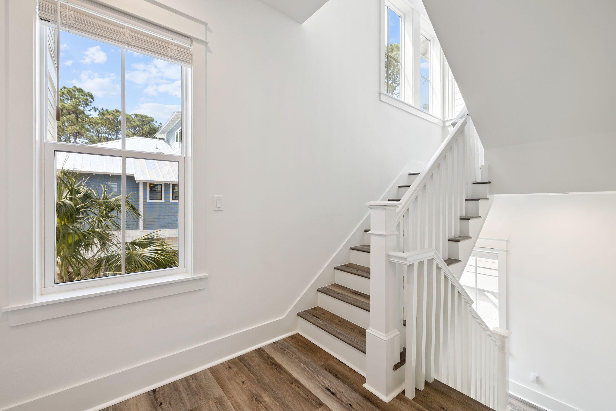 185 Redbud Ln Inlet Beach Inlet Beach, FL 32461 - Photo 20 of 71 a view of entryway with wooden floor and front door