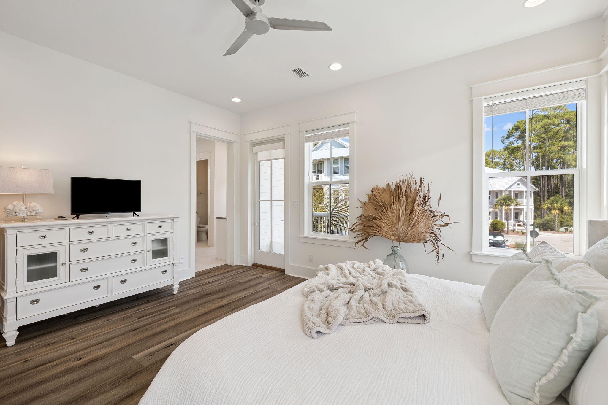 185 Redbud Ln Inlet Beach Inlet Beach, FL 32461 - Photo 23 of 71 a bedroom with a bed and flat screen tv