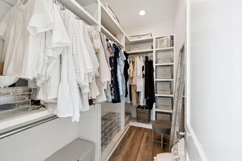 a bathroom with a shower and a bathroom