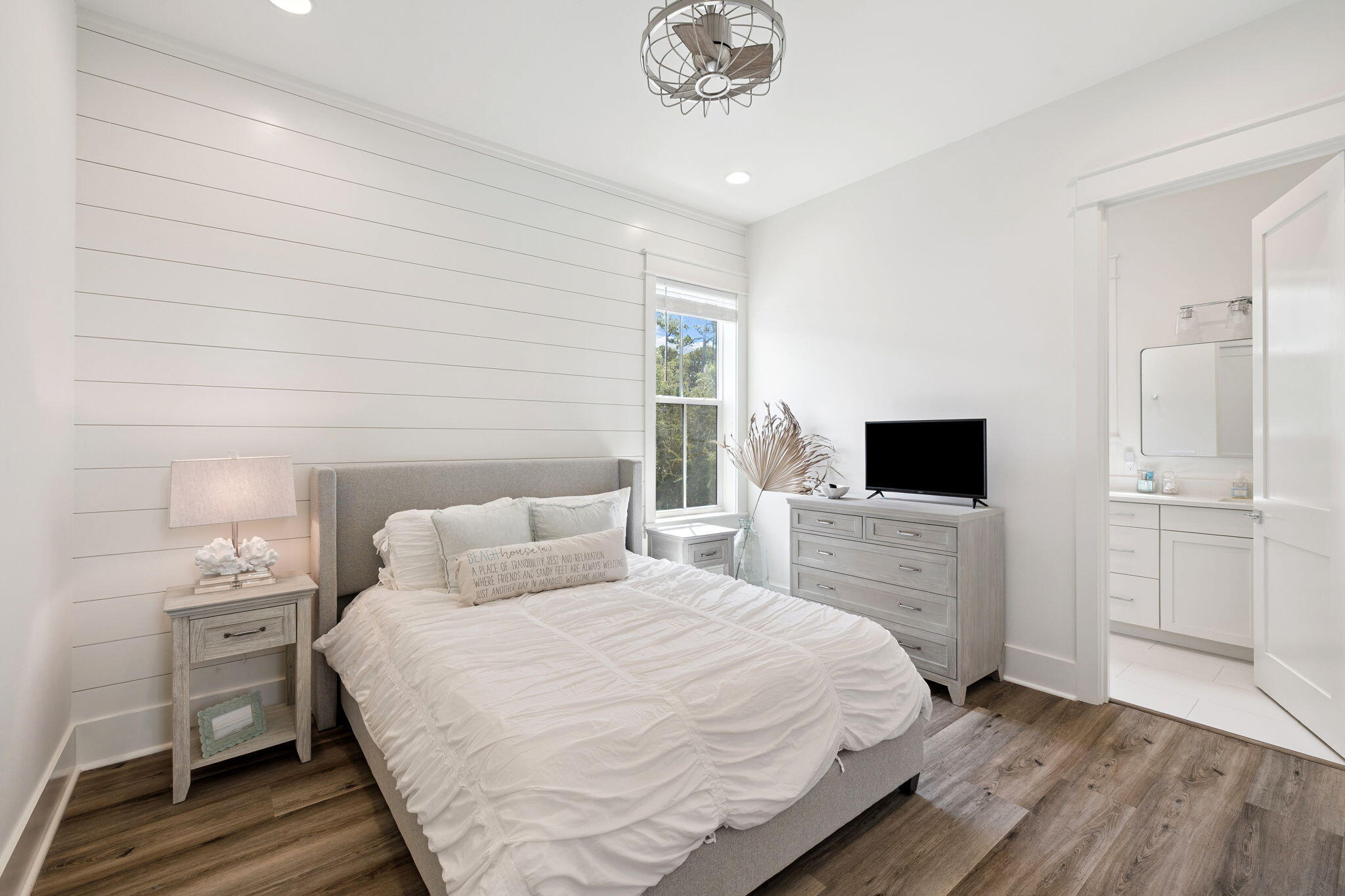 185 Redbud Ln Inlet Beach Inlet Beach, FL 32461 - Photo 29 of 71 a bedroom with a bed and a flat screen tv