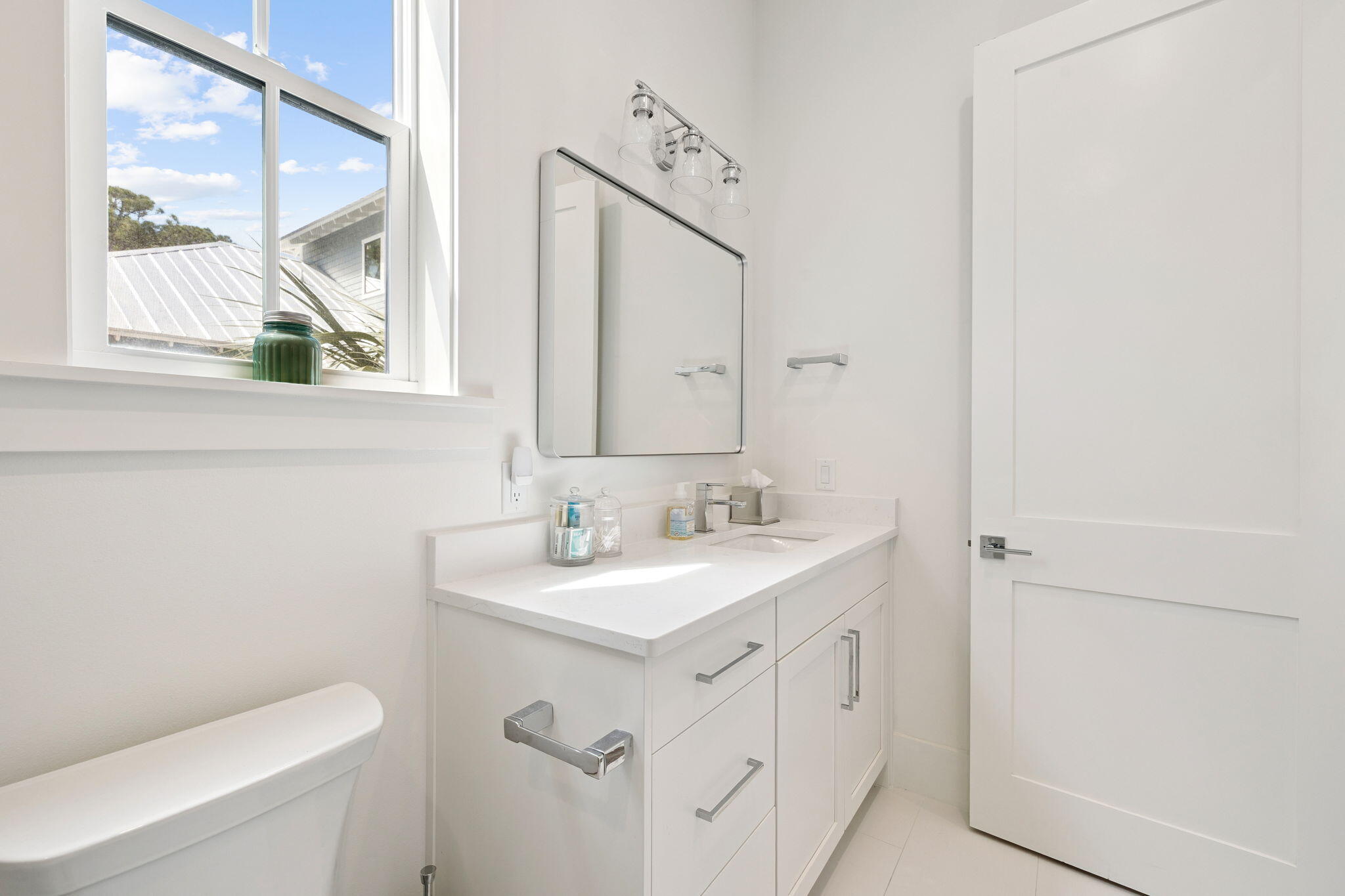 185 Redbud Ln Inlet Beach Inlet Beach, FL 32461 - Photo 31 of 71 a bathroom with a toilet sink and mirror