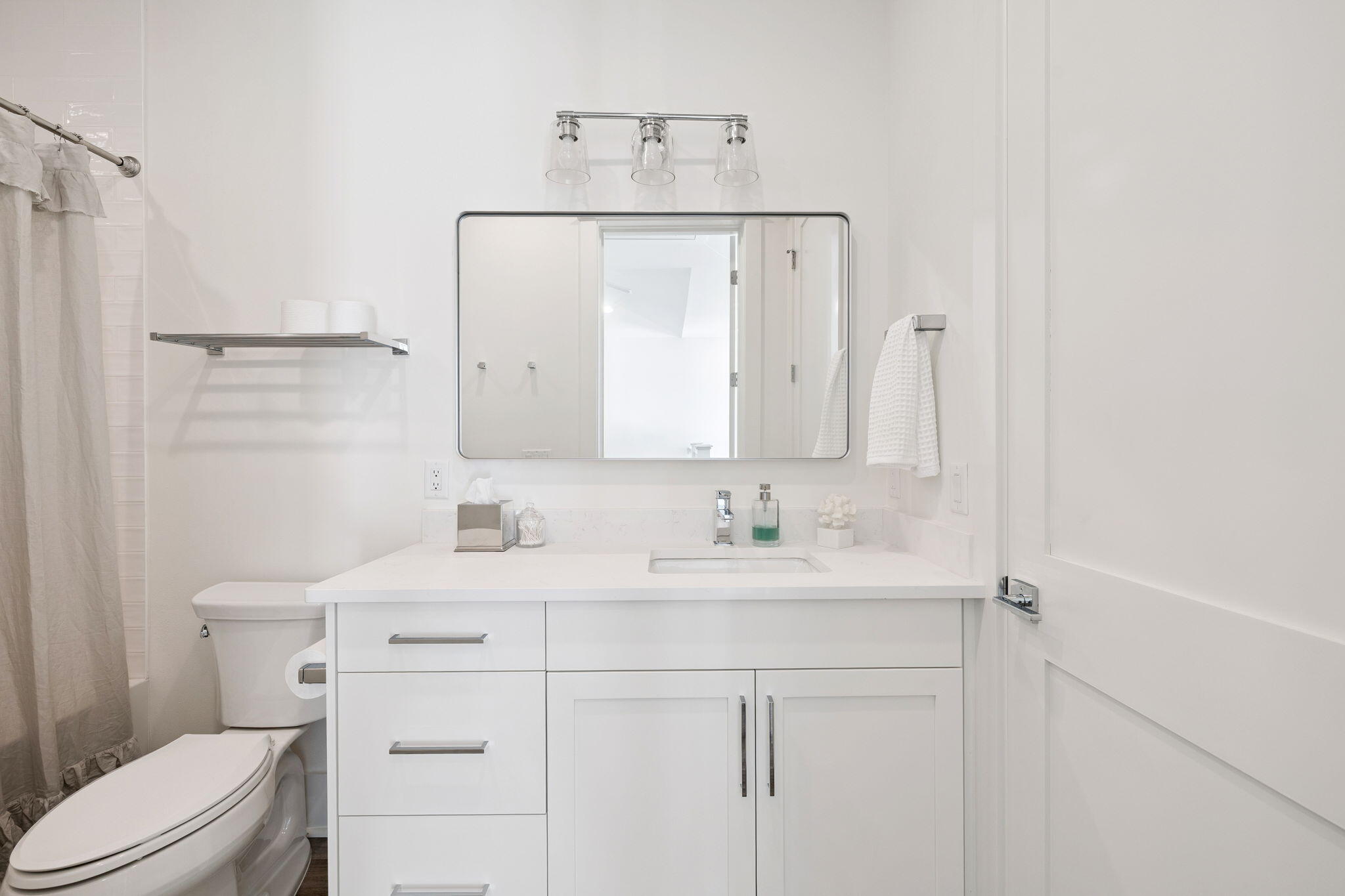 185 Redbud Ln Inlet Beach Inlet Beach, FL 32461 - Photo 53 of 71 a bathroom with a sink a toilet and mirror