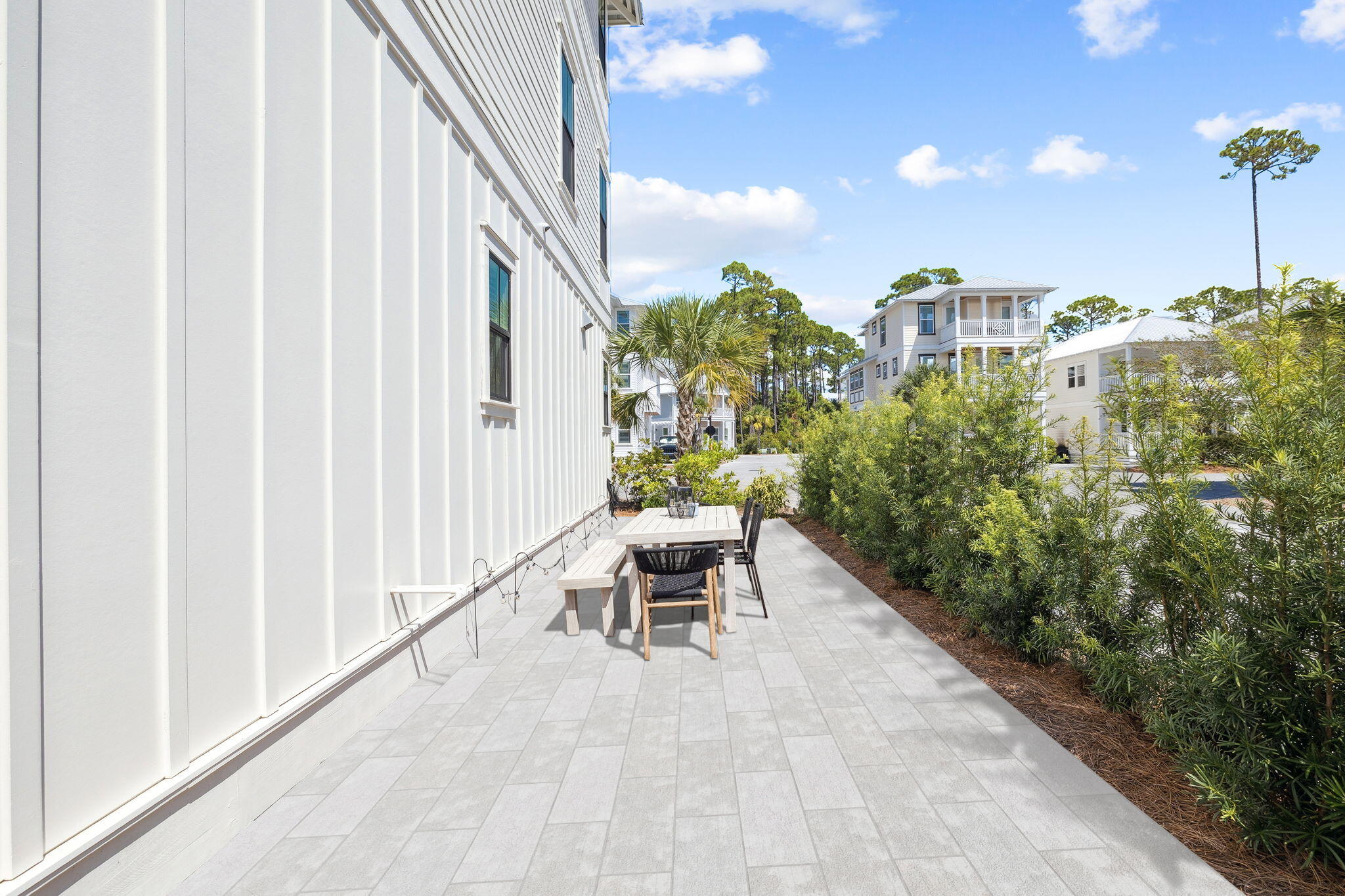 185 Redbud Ln Inlet Beach Inlet Beach, FL 32461 - Photo 59 of 71 a balcony with furniture and a potted plant
