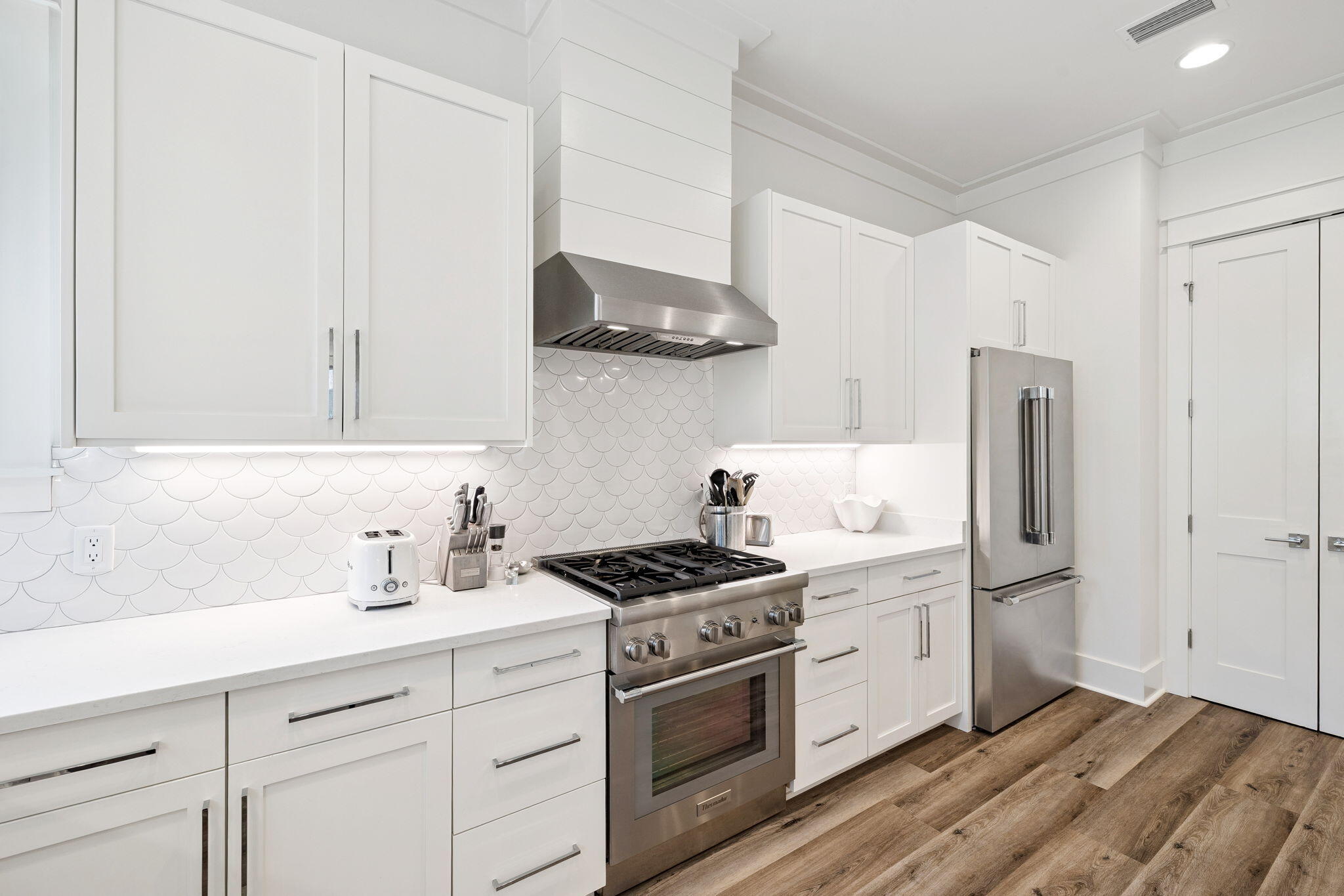 185 Redbud Ln Inlet Beach Inlet Beach, FL 32461 - Photo 9 of 71 a kitchen with stainless steel appliances granite countertop a sink stove and refrigerator