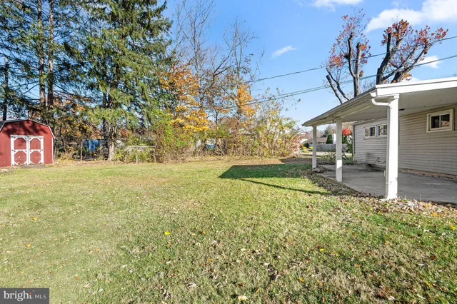 a view of outdoor space with deck and garden