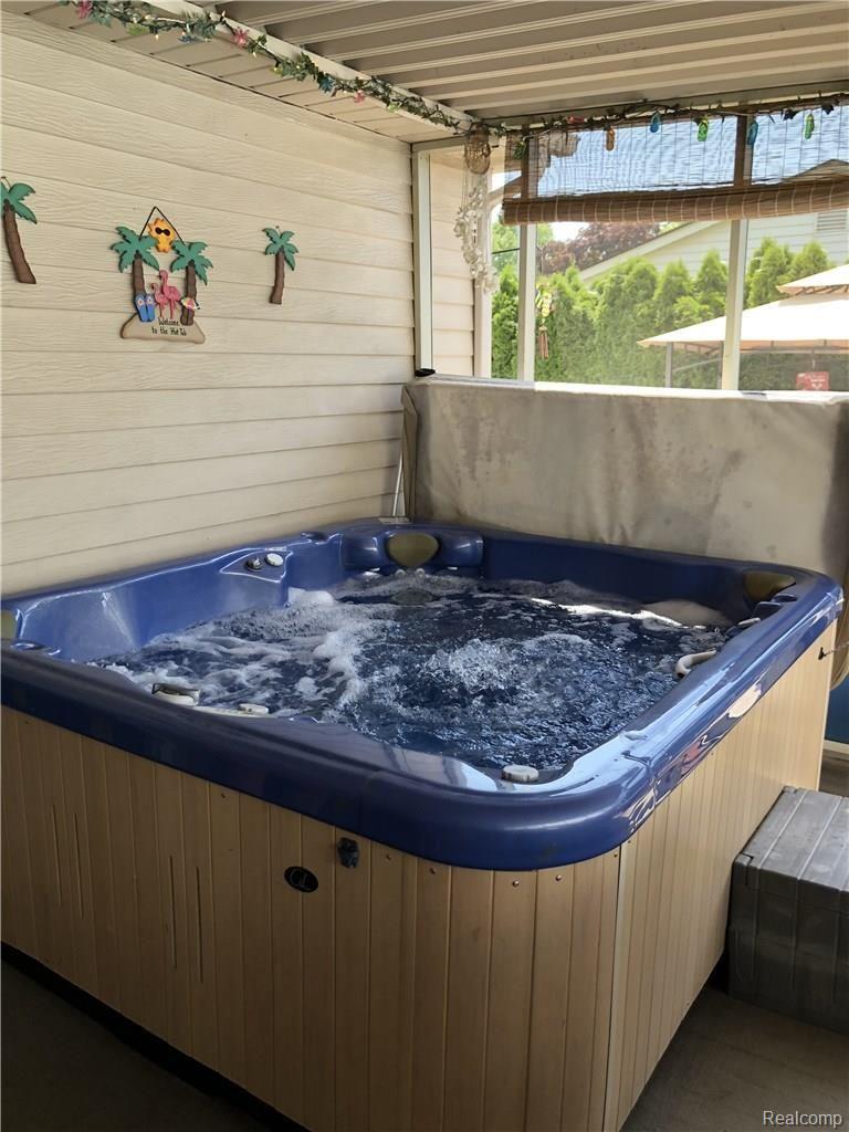 22296 Derby Road Trenton, MI 48183 - Photo 17 of 21 Hot tub in enclosed patio for year round use!
