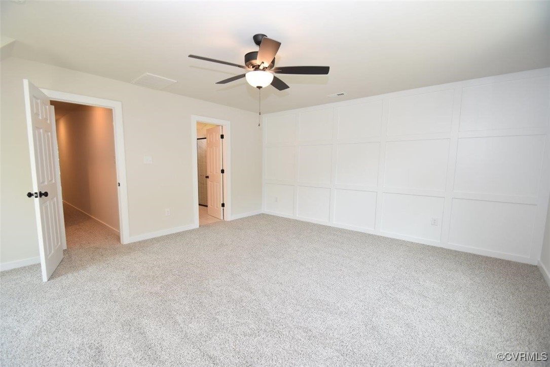 8729 Carters Mill Road Henrico, VA 23231 - Photo 11 of 33 Unfurnished bedroom featuring ceiling fan and ligh