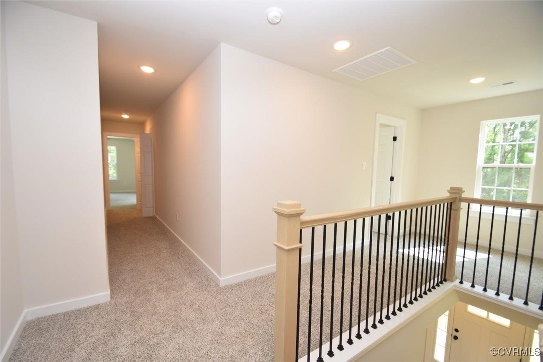 8729 Carters Mill Road Henrico, VA 23231 - Photo 19 of 33 Hallway featuring light colored carpet