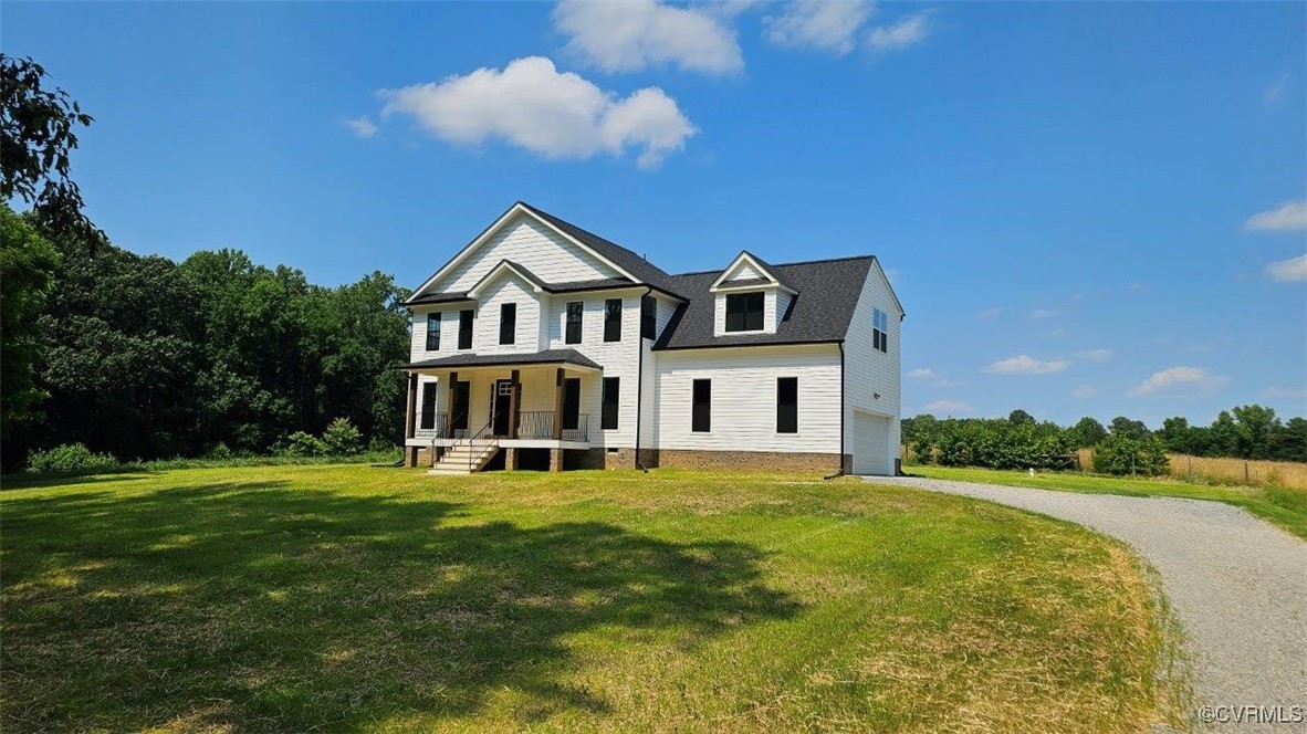 8729 Carters Mill Road Henrico, VA 23231 - Photo 33 of 33 View of front of house featuring a porch, a garage