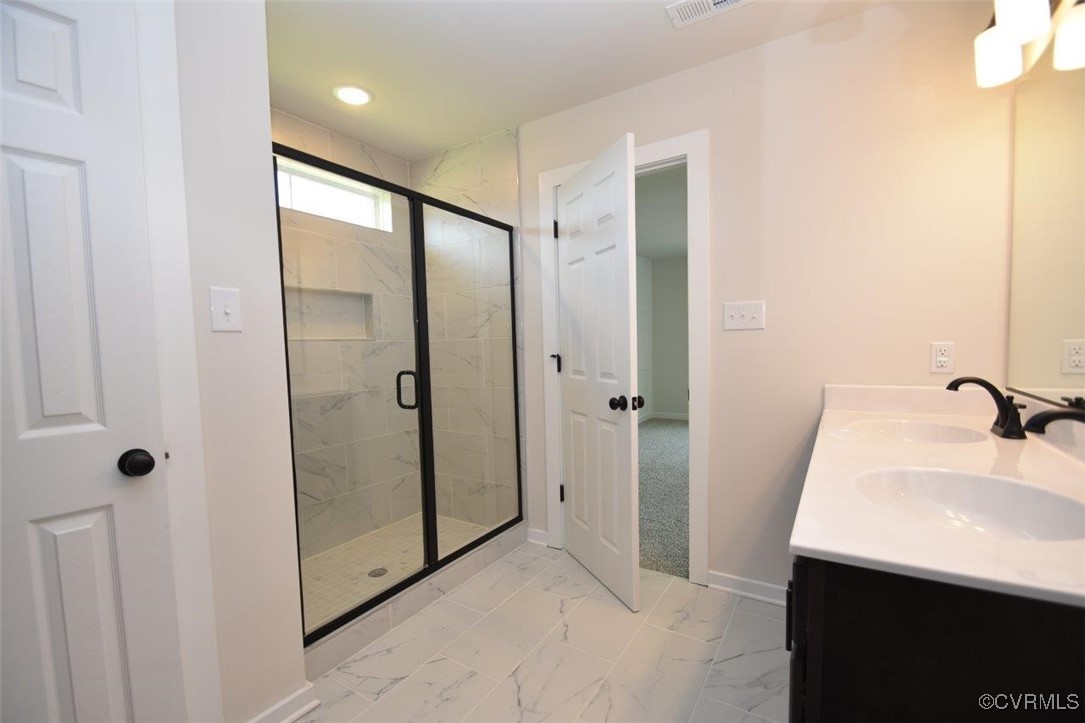 8729 Carters Mill Road Henrico, VA 23231 - Photo 5 of 33 Bathroom with vanity and walk in shower