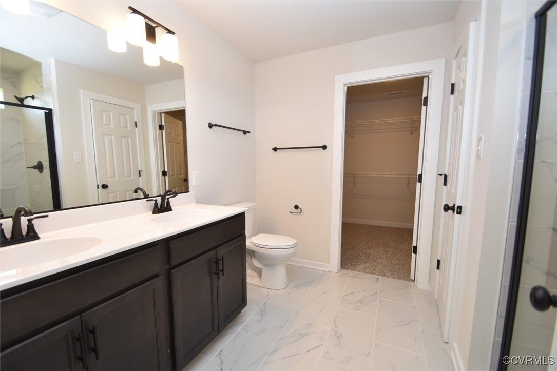 8729 Carters Mill Road Henrico, VA 23231 - Photo 7 of 33 Bathroom with vanity, toilet, and a shower with do