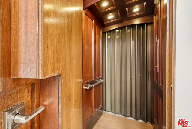 a view of a bathroom with shower and a sink