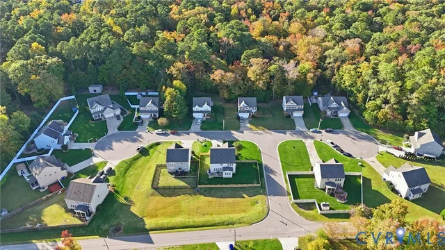 an aerial view of a swimming pool patio and mountain view
