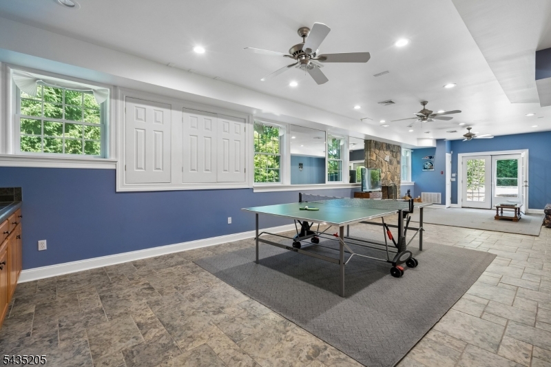12 Oak Hill Road Bernards, NJ 07920 - Photo 23 of 33 a living room with furniture a window and stainless steel appliances