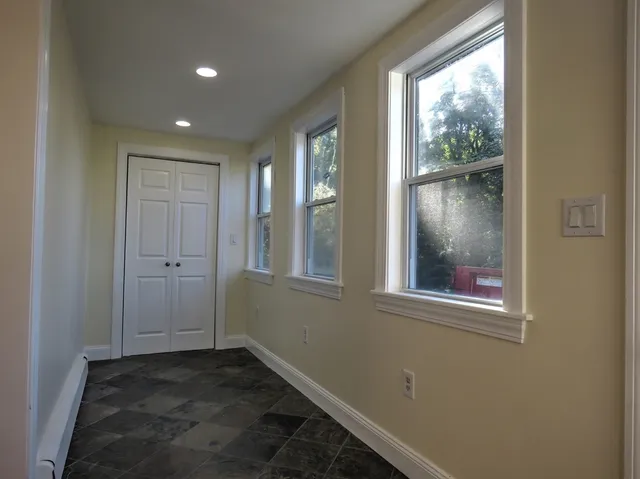 a view of an empty room and window