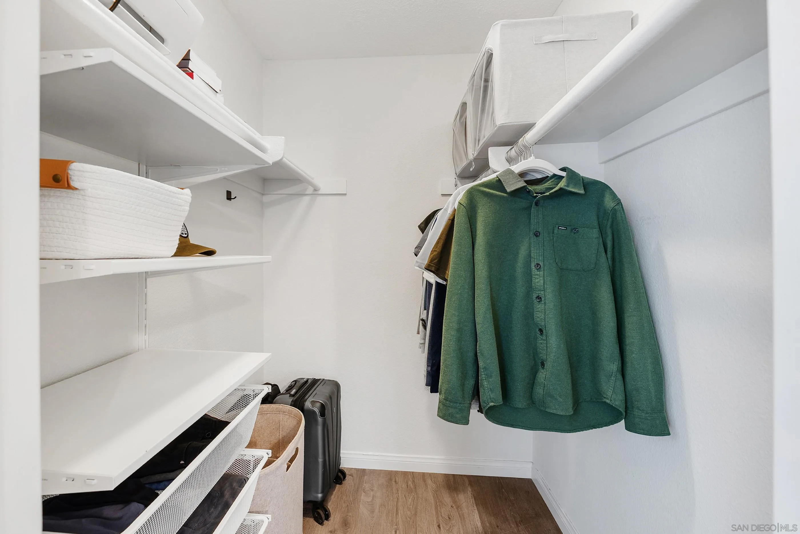 1810 South El Camino Real, Unit 101 Encinitas, CA 92024 - Photo 22 of 39 a view of walk in closet