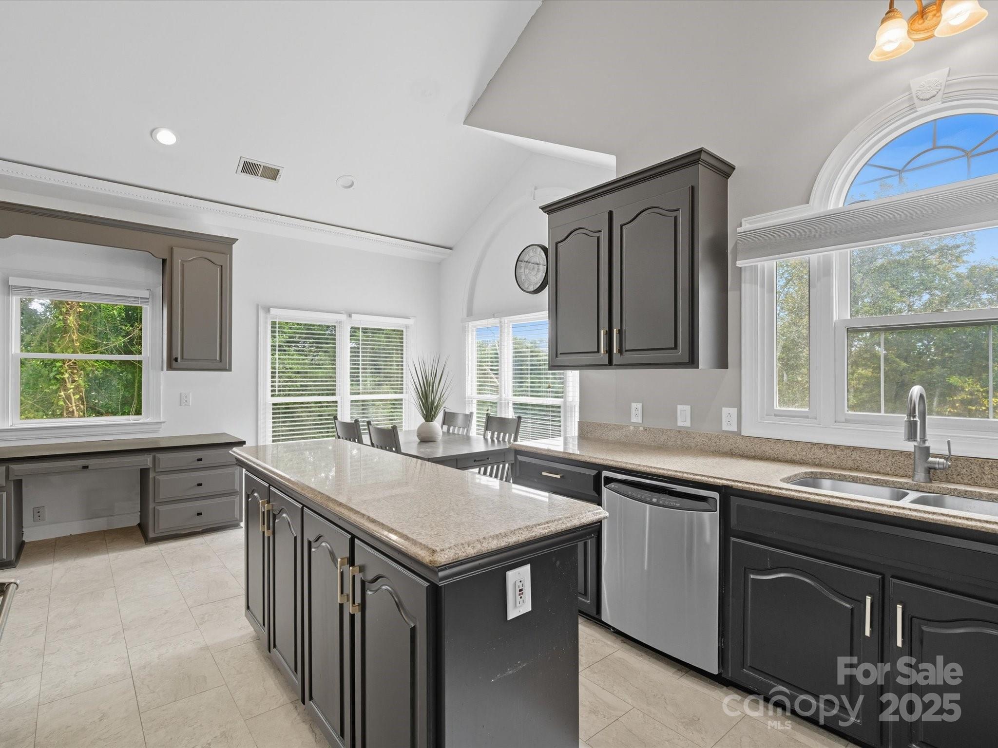 240 Petty Road Gastonia, NC 28056 - Photo 14 of 48 a kitchen with a sink and large window