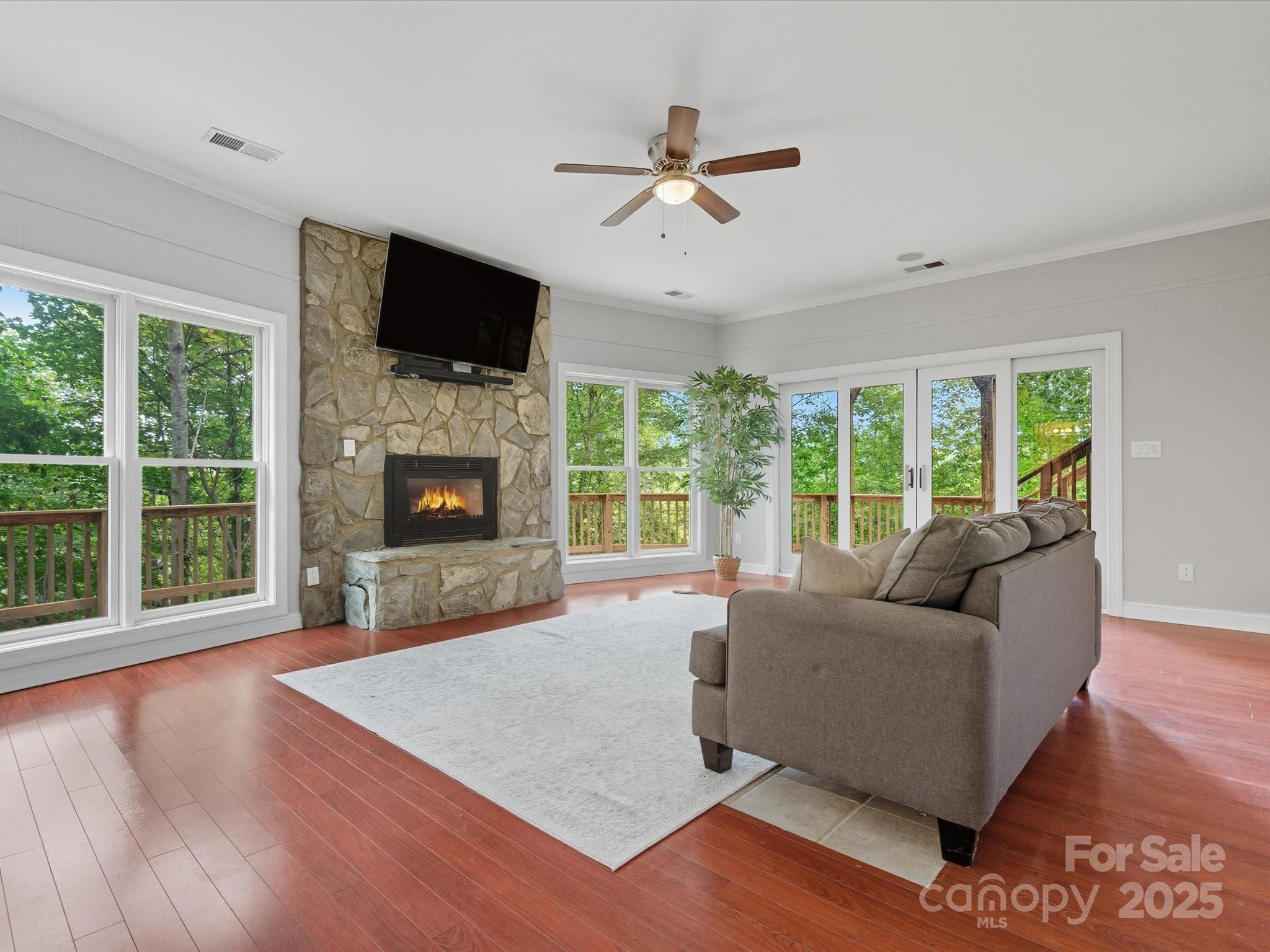 240 Petty Road Gastonia, NC 28056 - Photo 28 of 48 a living room with furniture fireplace and flat screen tv
