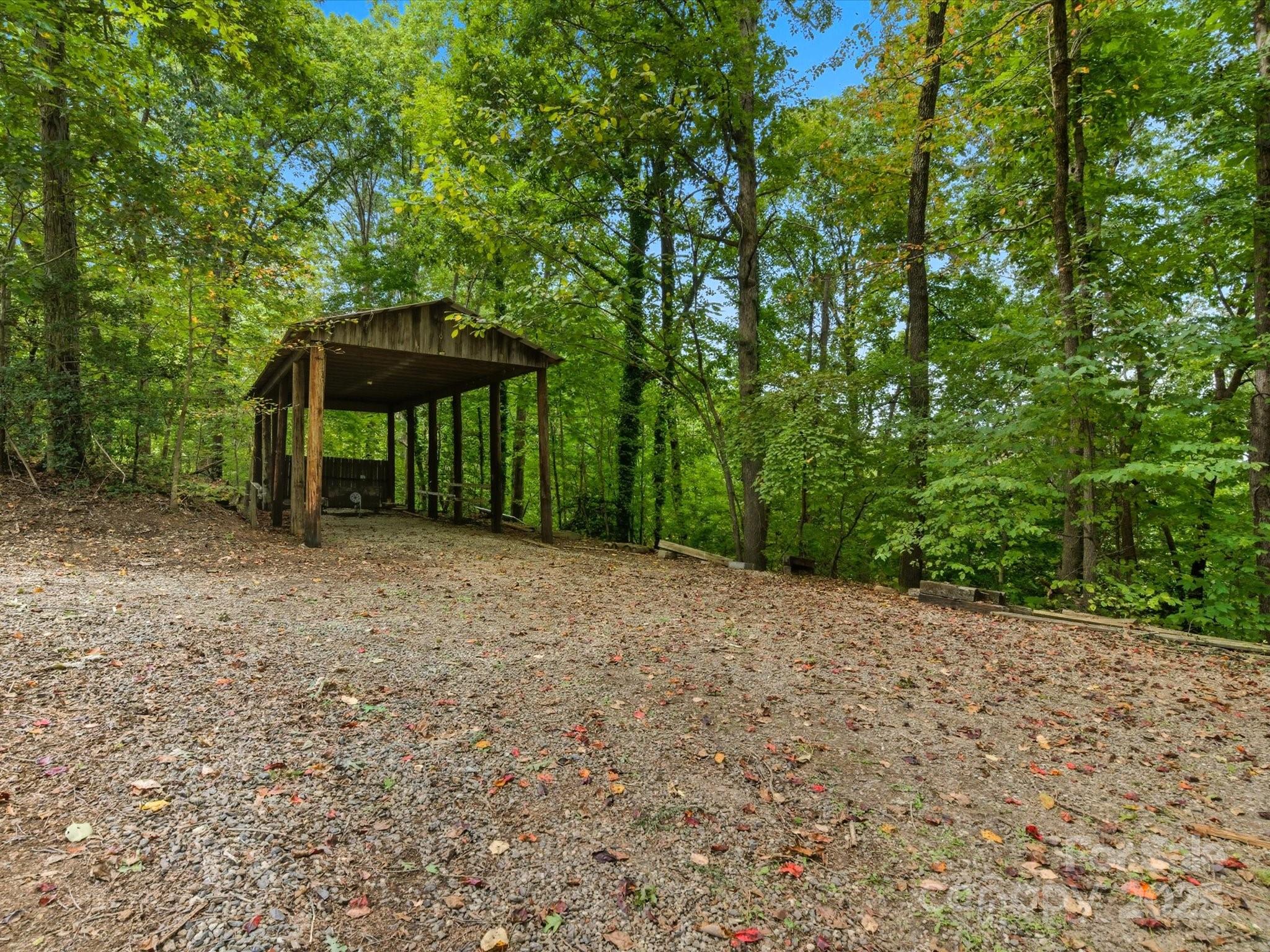 240 Petty Road Gastonia, NC 28056 - Photo 44 of 48 a view of a backyard with a trees