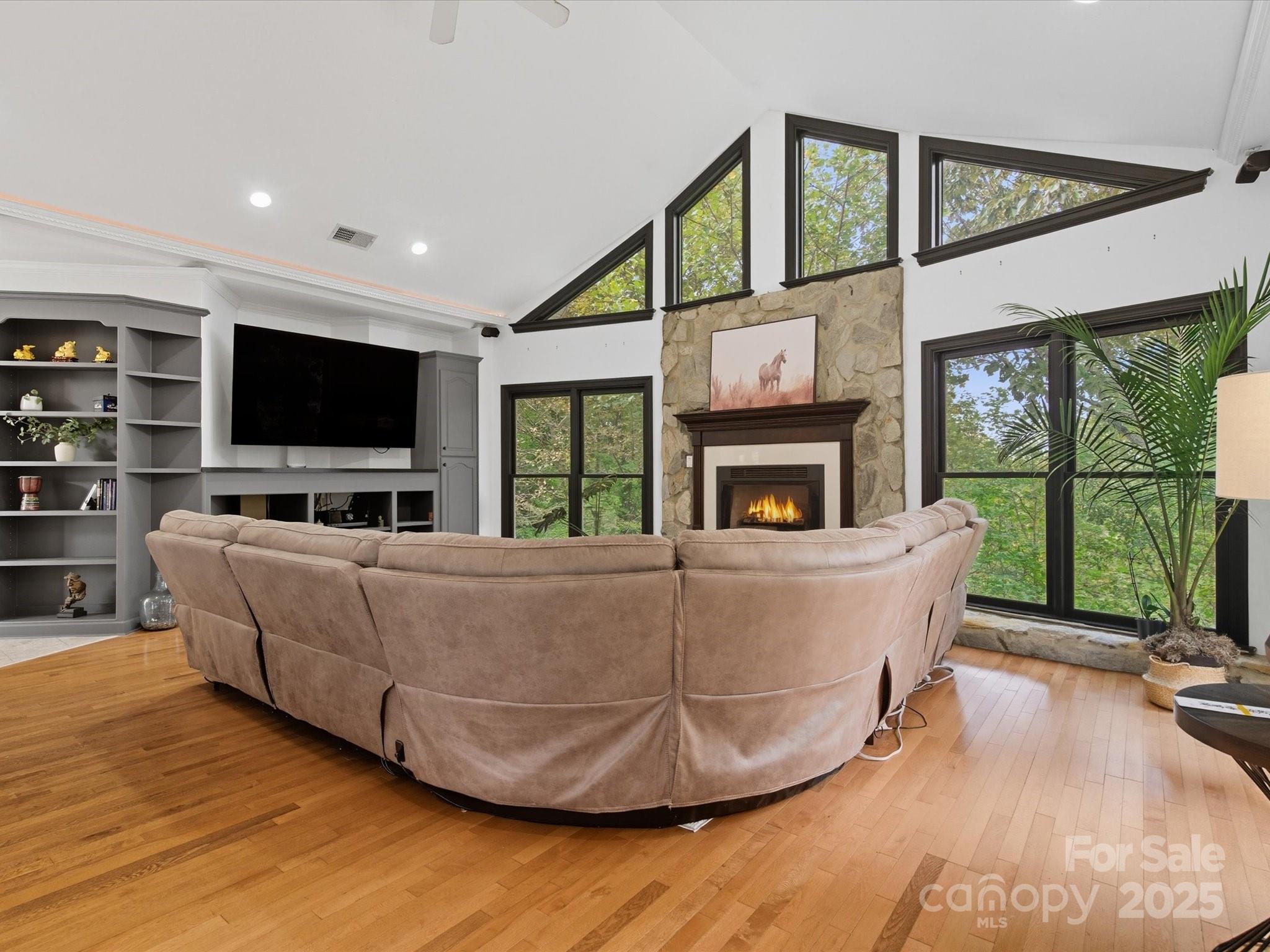240 Petty Road Gastonia, NC 28056 - Photo 10 of 48 a living room with furniture and a flat screen tv