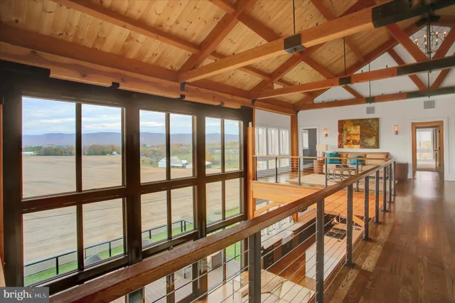 a aerial view of a house with a big yard