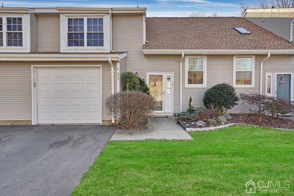 71 Winchester Way Somerset, NJ 08873 - Photo 1 of 24 a view of a house with backyard and a tree