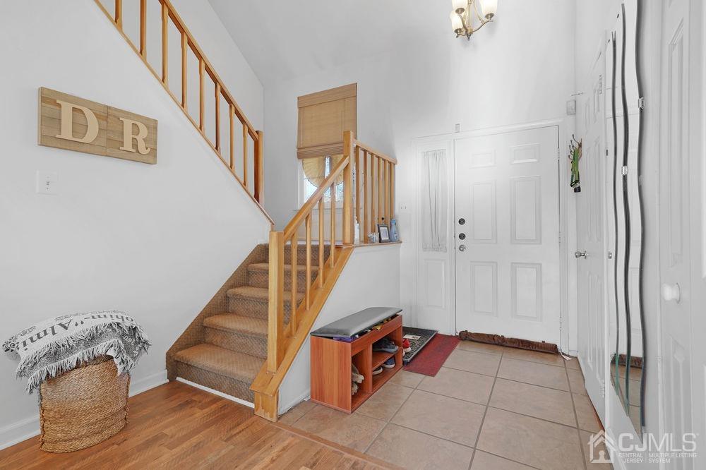 71 Winchester Way Somerset, NJ 08873 - Photo 2 of 24 a view of livingroom with furniture and stairs