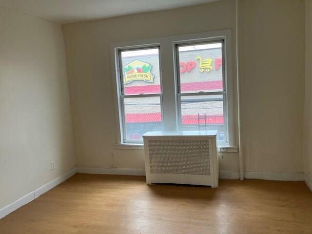 3925 White Plains Road, Unit 4A Bronx, NY 10466 - Photo 2 of 4 an empty room with windows and entrance