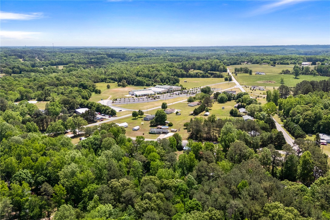 209 Short Cut Road Westminster, SC 29693 - Photo 14 of 27 This elevated perspective captures the expansive beauty of a sprawling green landscape with clear skies.