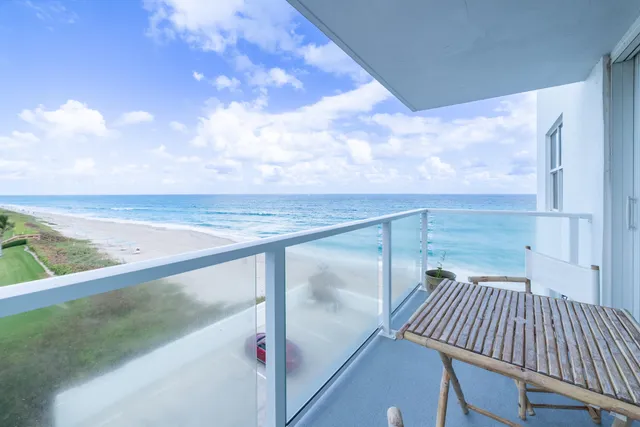 a view of a balcony with city view