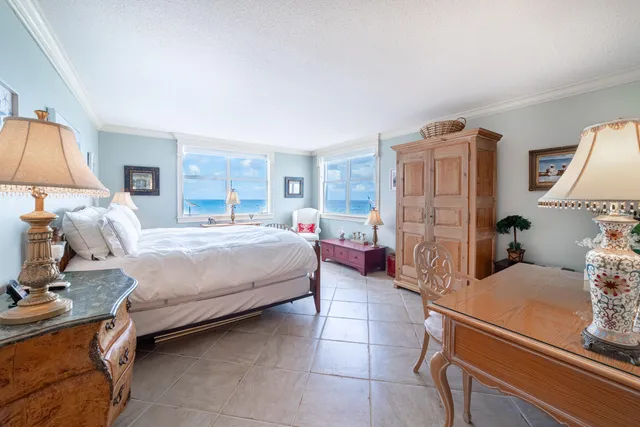 a bed room with a bed and a window