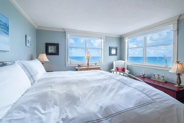 a spacious bathroom with a double vanity sink mirror and double