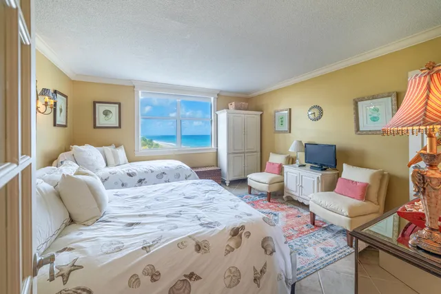 a bathroom with a bathtub and toilet