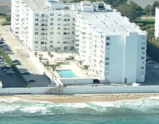 a view of a lake with a yard