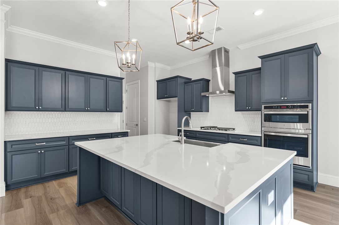 141 Rickys Path Easley, SC 29642 - Photo 11 of 40 This kitchen features a bright ambiance, with a large island for meal preparation and stylish cabinetry.