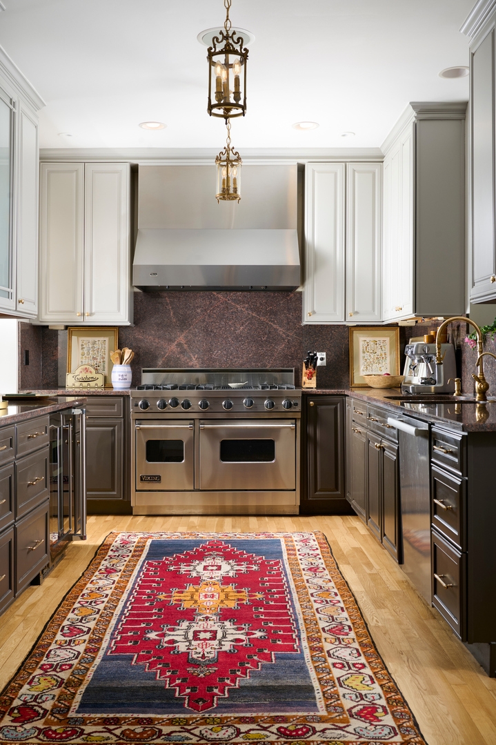 635 West Sheridan Road, Unit 3 Chicago, IL 60613 - Photo 18 of 48 a kitchen with stainless steel appliances granite countertop a stove a sink and a microwave