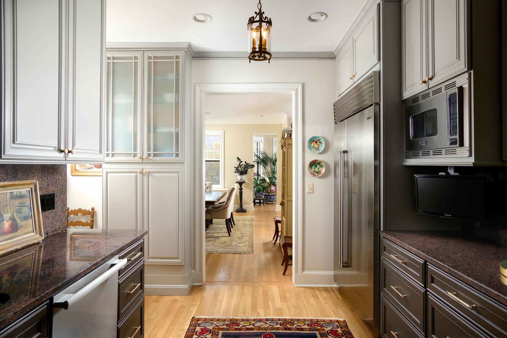 635 West Sheridan Road, Unit 3 Chicago, IL 60613 - Photo 23 of 48 a kitchen with stainless steel appliances granite countertop a refrigerator and a stove