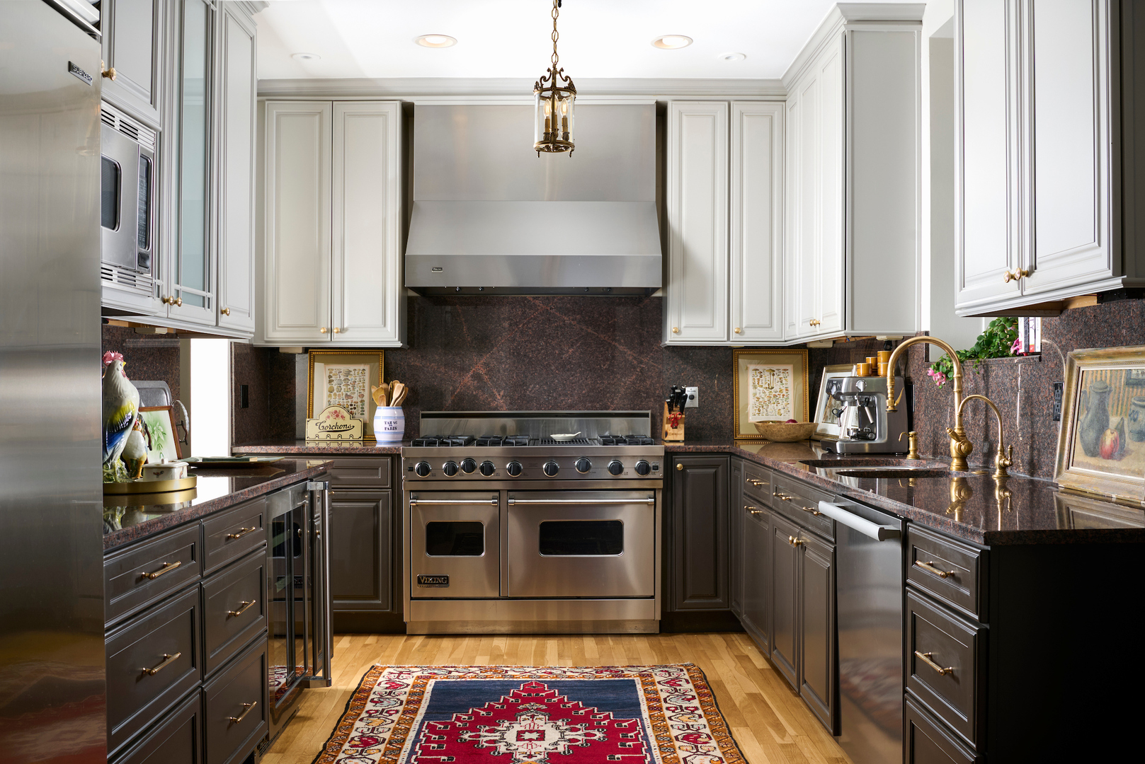 635 West Sheridan Road, Unit 3 Chicago, IL 60613 - Photo 25 of 48 a kitchen with stainless steel appliances granite countertop a stove a sink and a granite counter tops