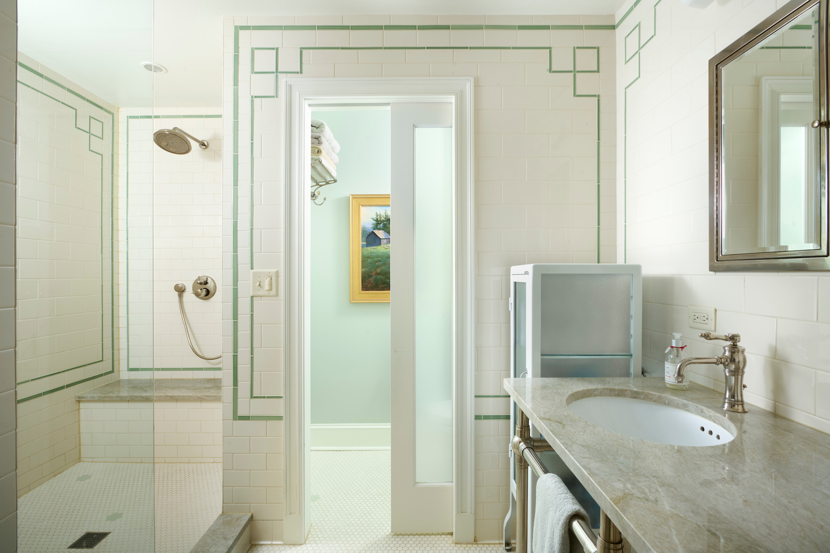 635 West Sheridan Road, Unit 3 Chicago, IL 60613 - Photo 32 of 48 a bathroom with a granite countertop sink mirror and shower