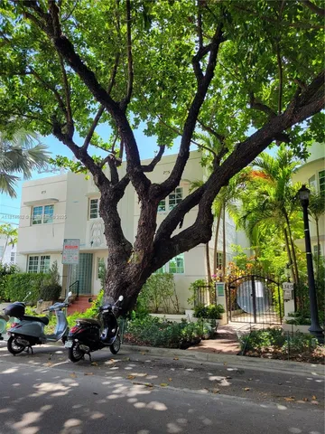 a car parked in front of a house