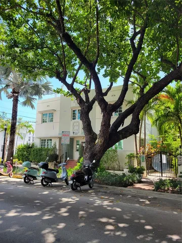 a view of a street with cars