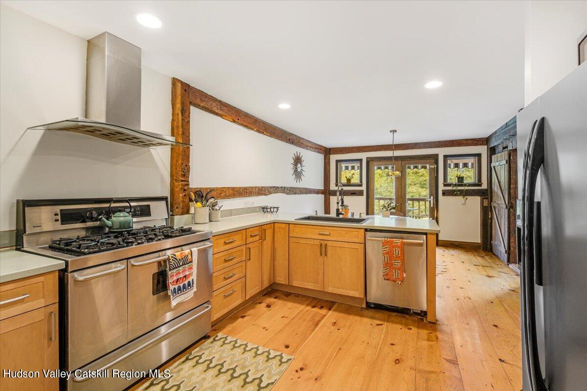 5 Longview Road Clinton, NY 12514 - Photo 13 of 44 a kitchen with stainless steel appliances granite countertop a sink stove and refrigerator