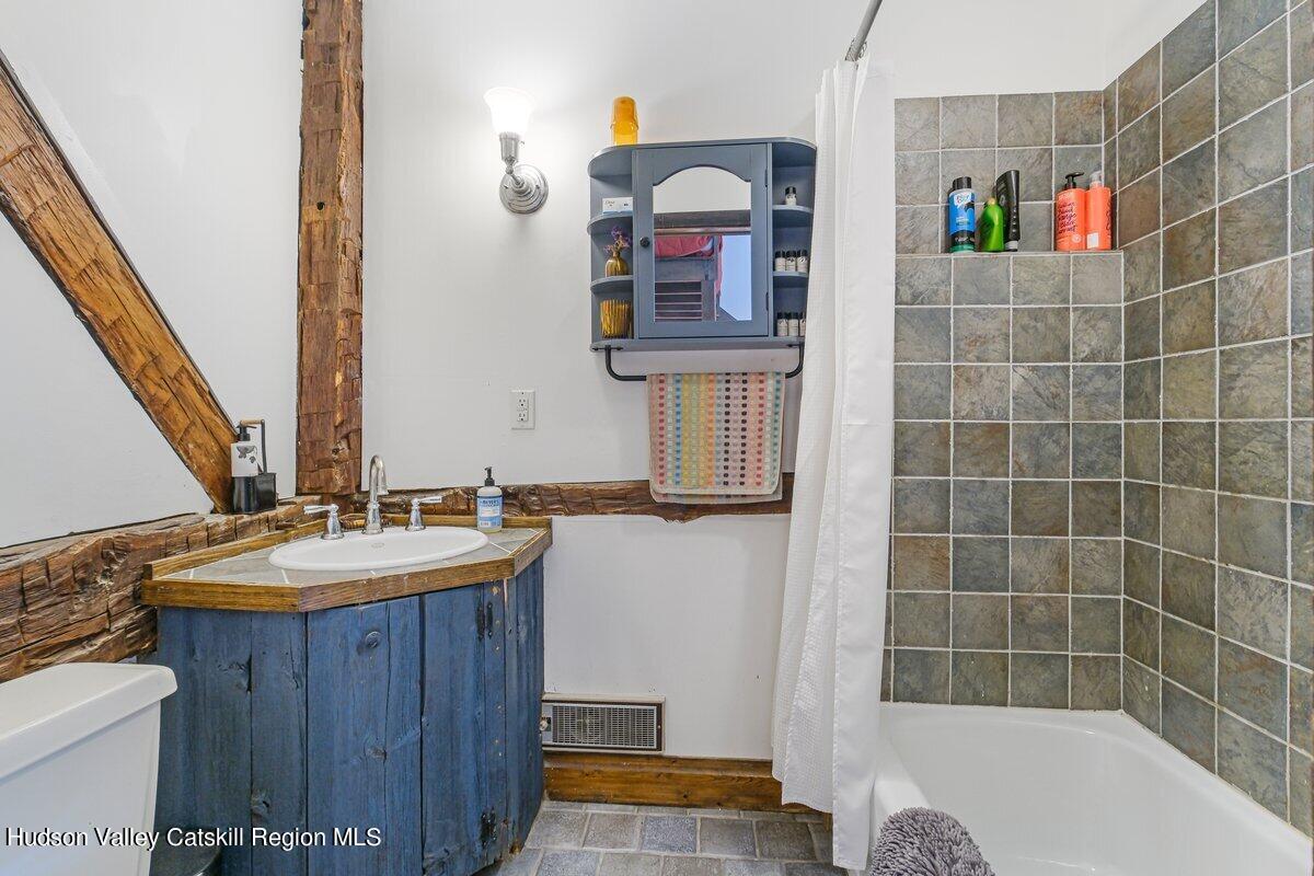 5 Longview Road Clinton, NY 12514 - Photo 27 of 44 a bathroom with a sink and a mirror