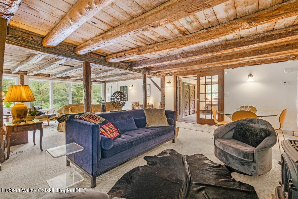 5 Longview Road Clinton, NY 12514 - Photo 29 of 44 a living room with furniture and a large window