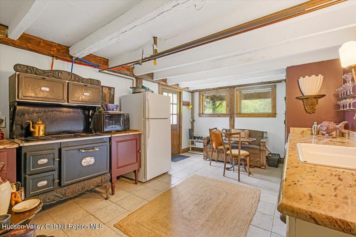 5 Longview Road Clinton, NY 12514 - Photo 34 of 44 a kitchen with stainless steel appliances granite countertop a sink and cabinets